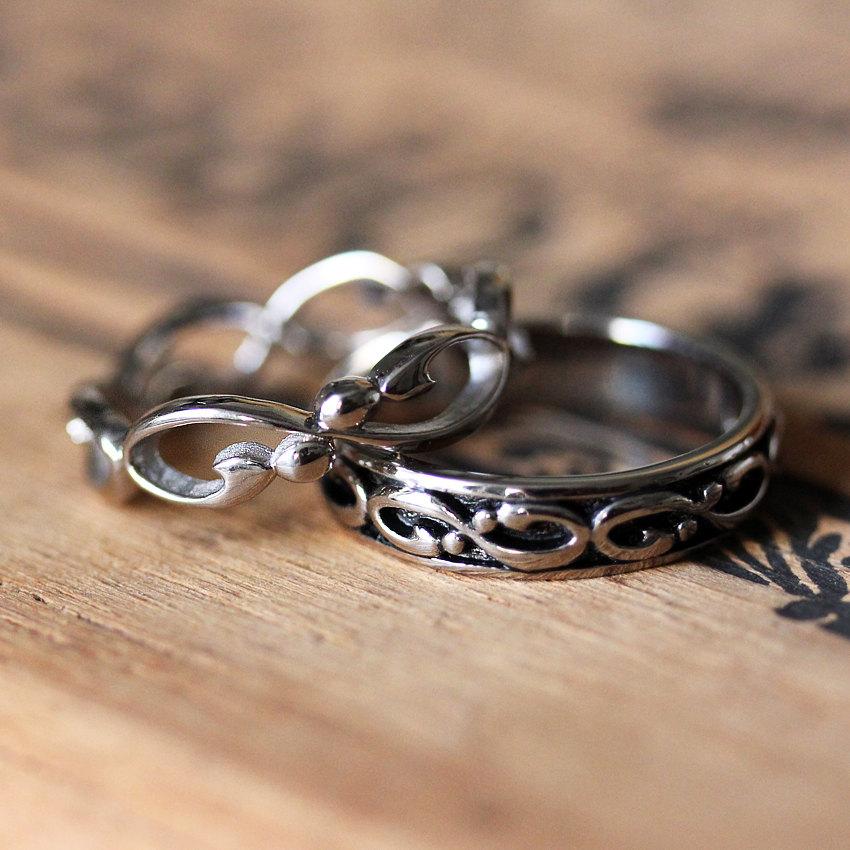 Wedding pick ring metal his rings shutterstock via